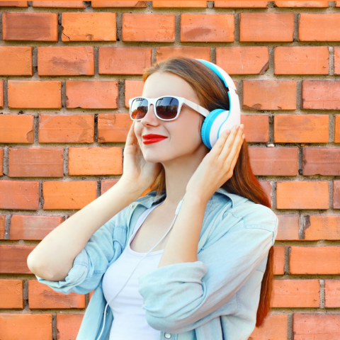 Lady listening to an awesome podcast.